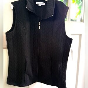 Emily Daniel’s black vest